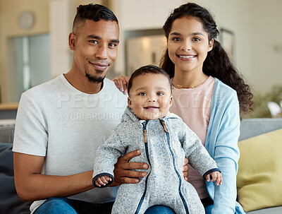 Buy stock photo Family, smile and portrait of baby in home living room, bonding and having fun in house. Father, mother and face of child on sofa, relax with newborn and enjoying quality time together with happiness