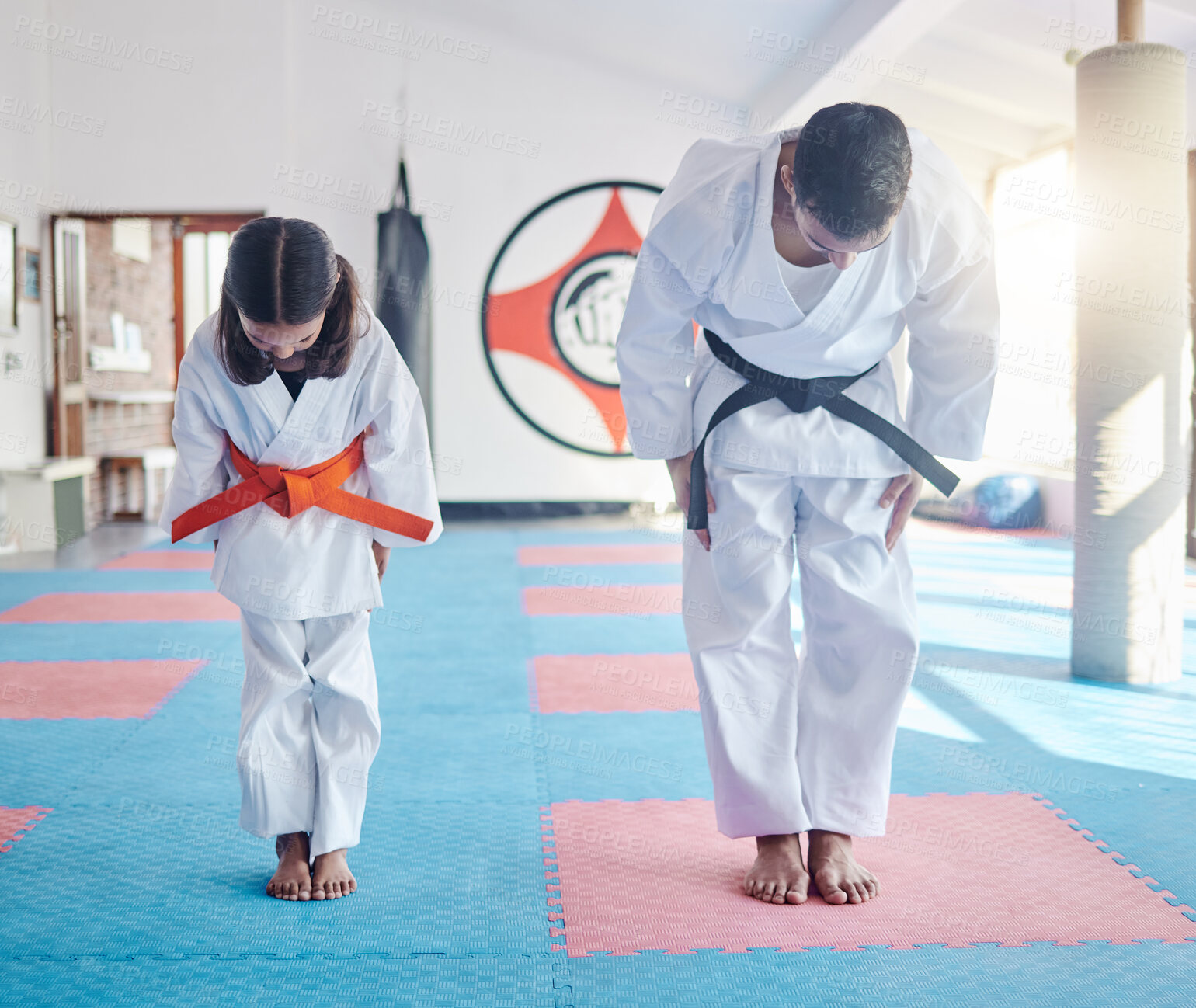 Buy stock photo Child, teacher or bow in dojo for martial arts, training or exercise to prepare for karate education. Respect, warrior or judo master with girl kid in studio ready for taekwondo practice or workout