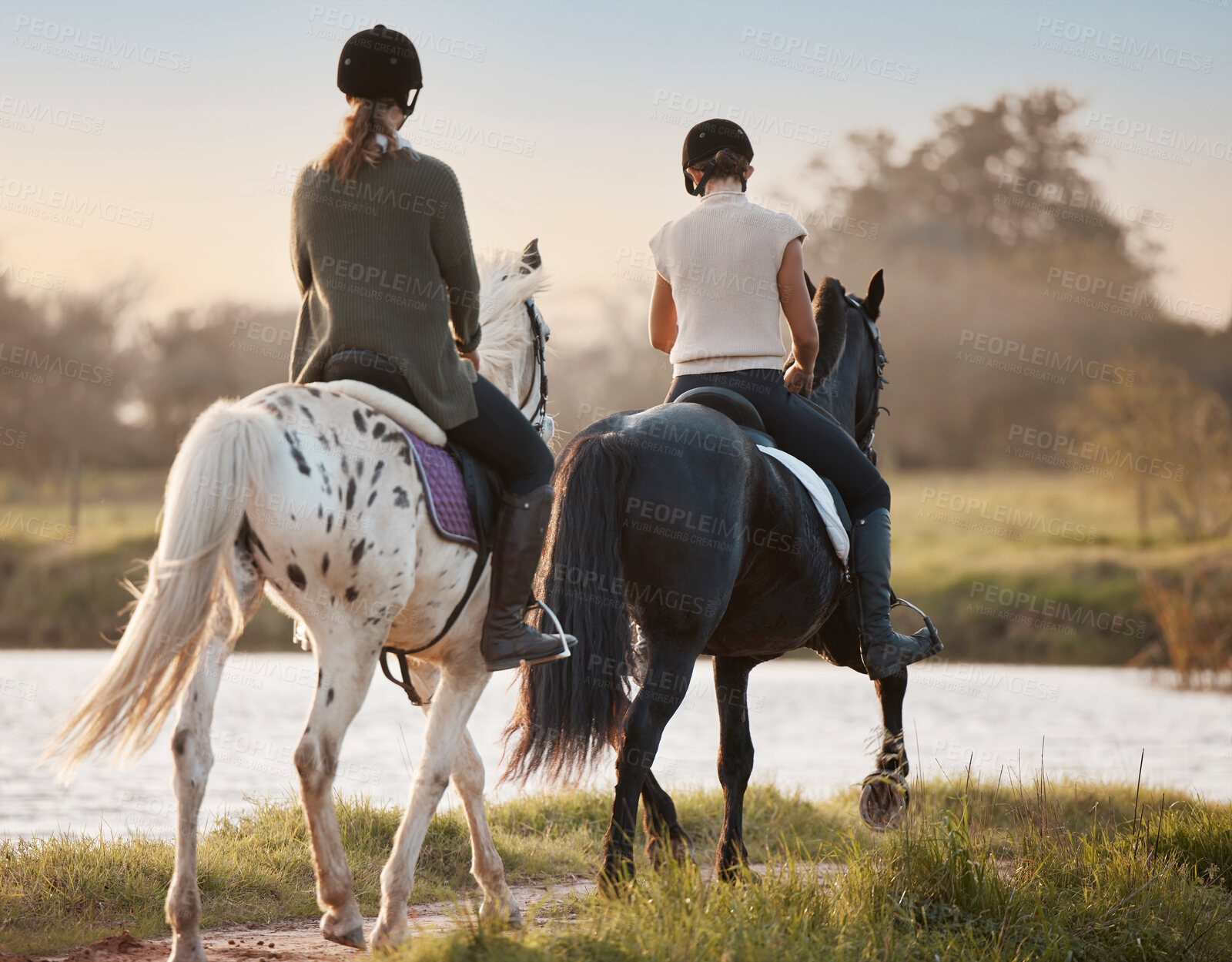 Buy stock photo Horse riding, friends and people outdoor by lake on vacation, holiday or travel in countryside. Equestrian, animal and women on horseback at river on adventure or journey together in nature at field