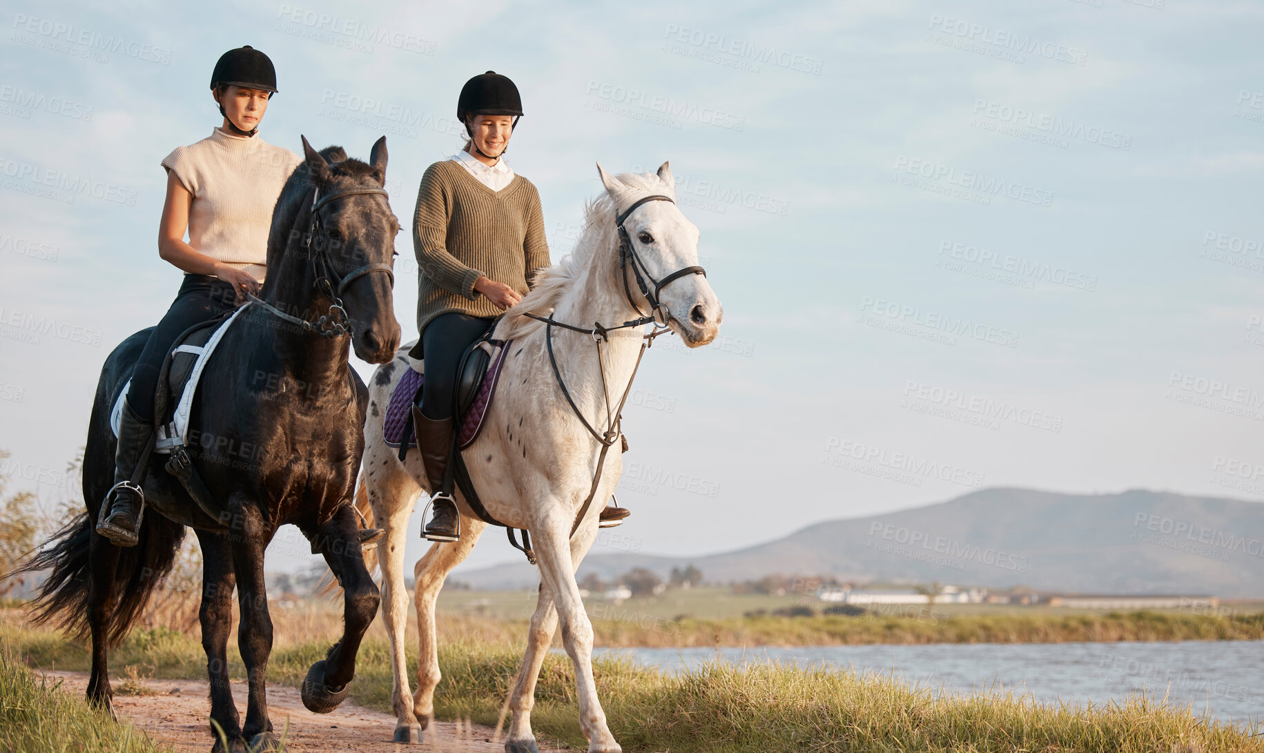 Buy stock photo Friends, women and horses in countryside for riding, freedom and recreation for adventure with pets. Farm, females equestrian and stallion for training, sports and bonding with animals by river