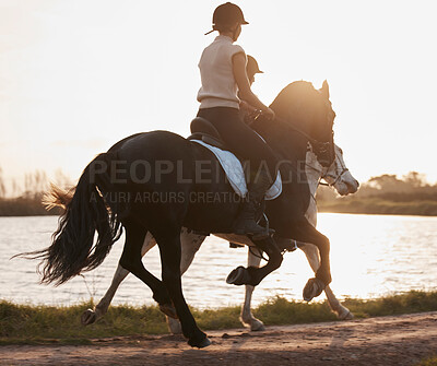 Buy stock photo Sunset, horse riding and friends in countryside for fitness, freedom and exercise in nature. Summer, people and equestrian training or athlete by water with animals, sport and outdoor for health 