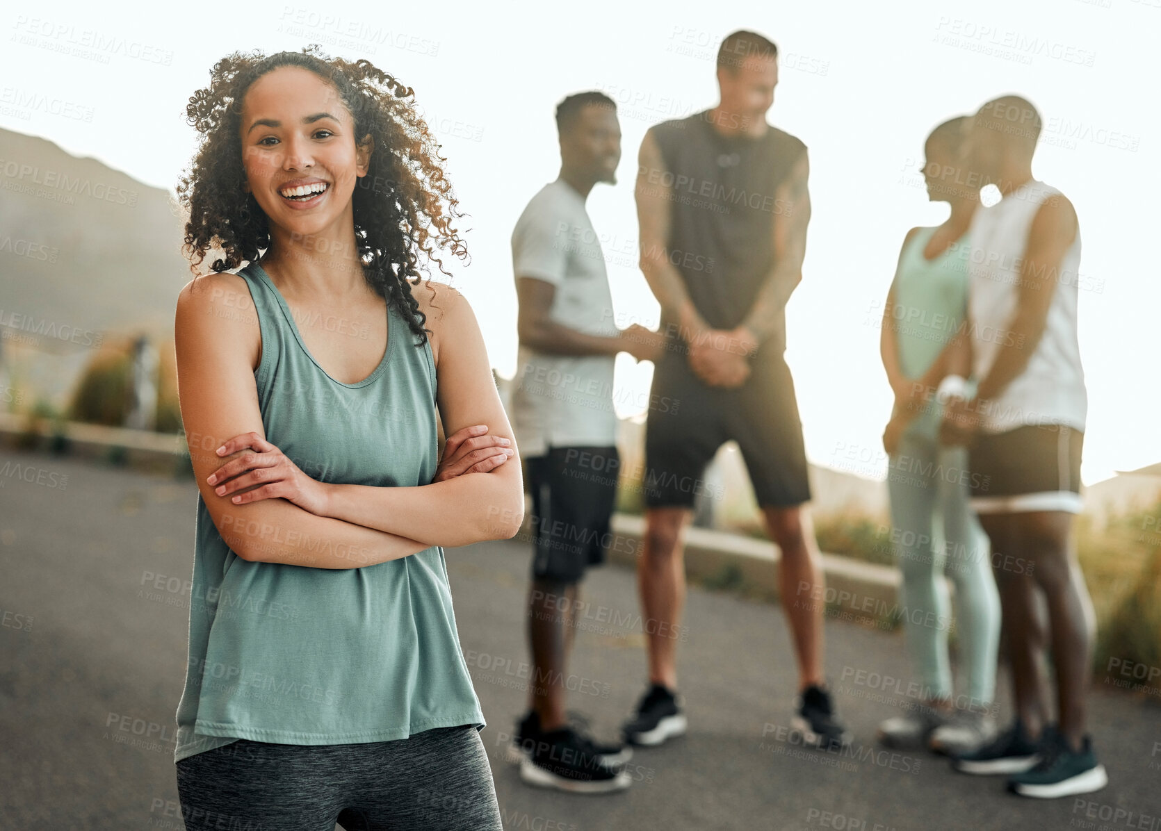 Buy stock photo Runner, portrait and happy woman with arms crossed in road for fitness, endurance training or marathon exhibition. Mountain, diversity and athlete with friends for cardio, race or exercise challenge
