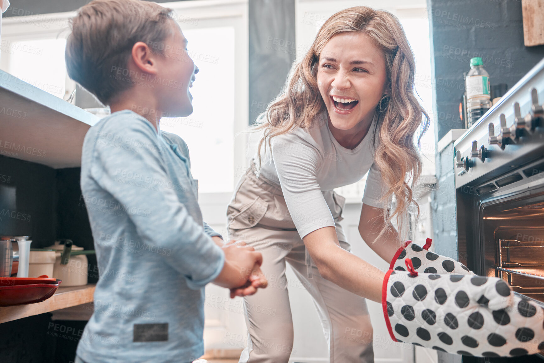 Buy stock photo Mother, baking and boy or home oven, child development and helping in kitchen together with dessert or cookies. Happiness, childhood and fun activity with stove, teaching and bonding in apartment