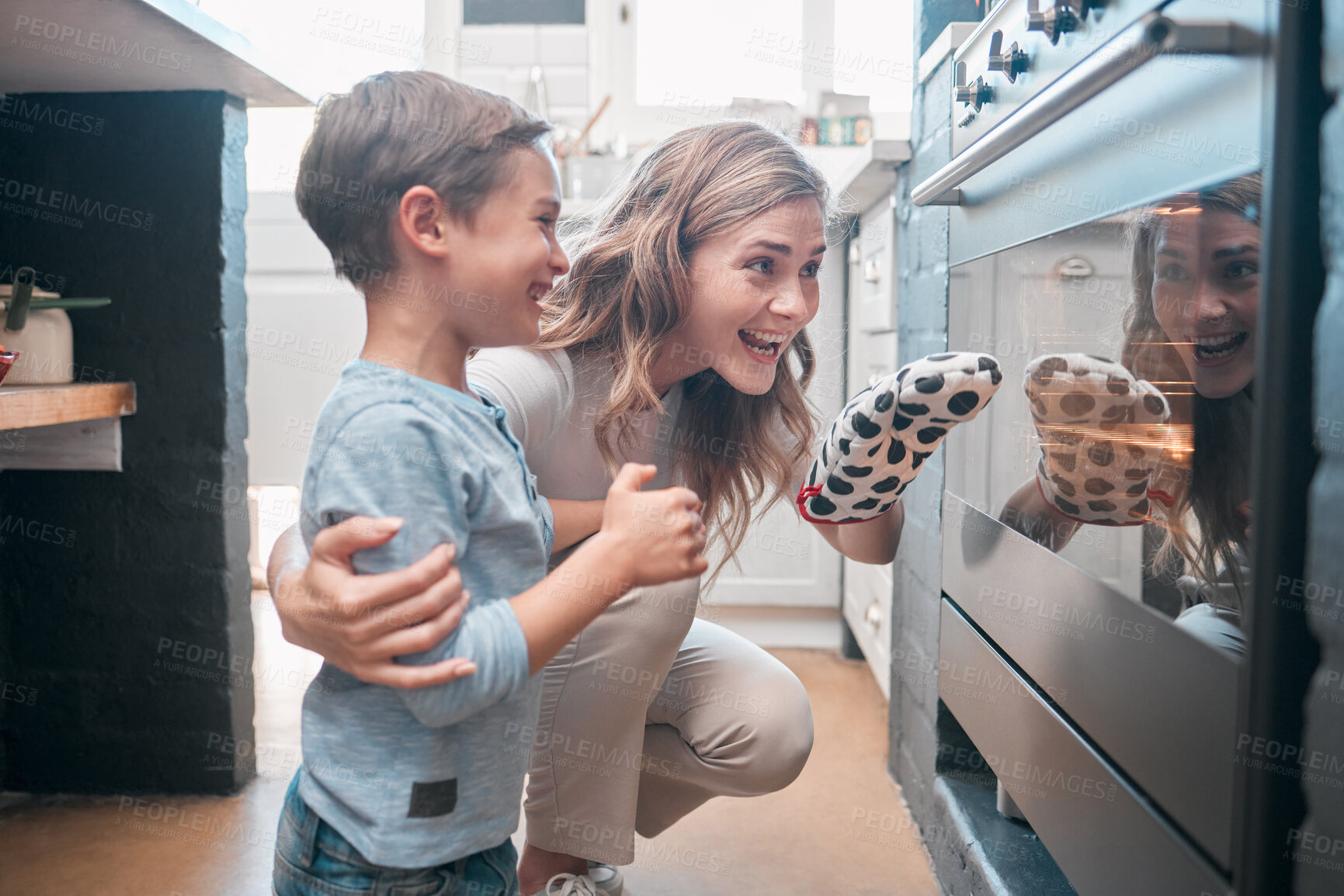 Buy stock photo Mom, child and kitchen with oven for learning or teaching recipe, cooking food and development in home. Happy mama, young boy and waiting with watch or check baking, growth and excited for cookies