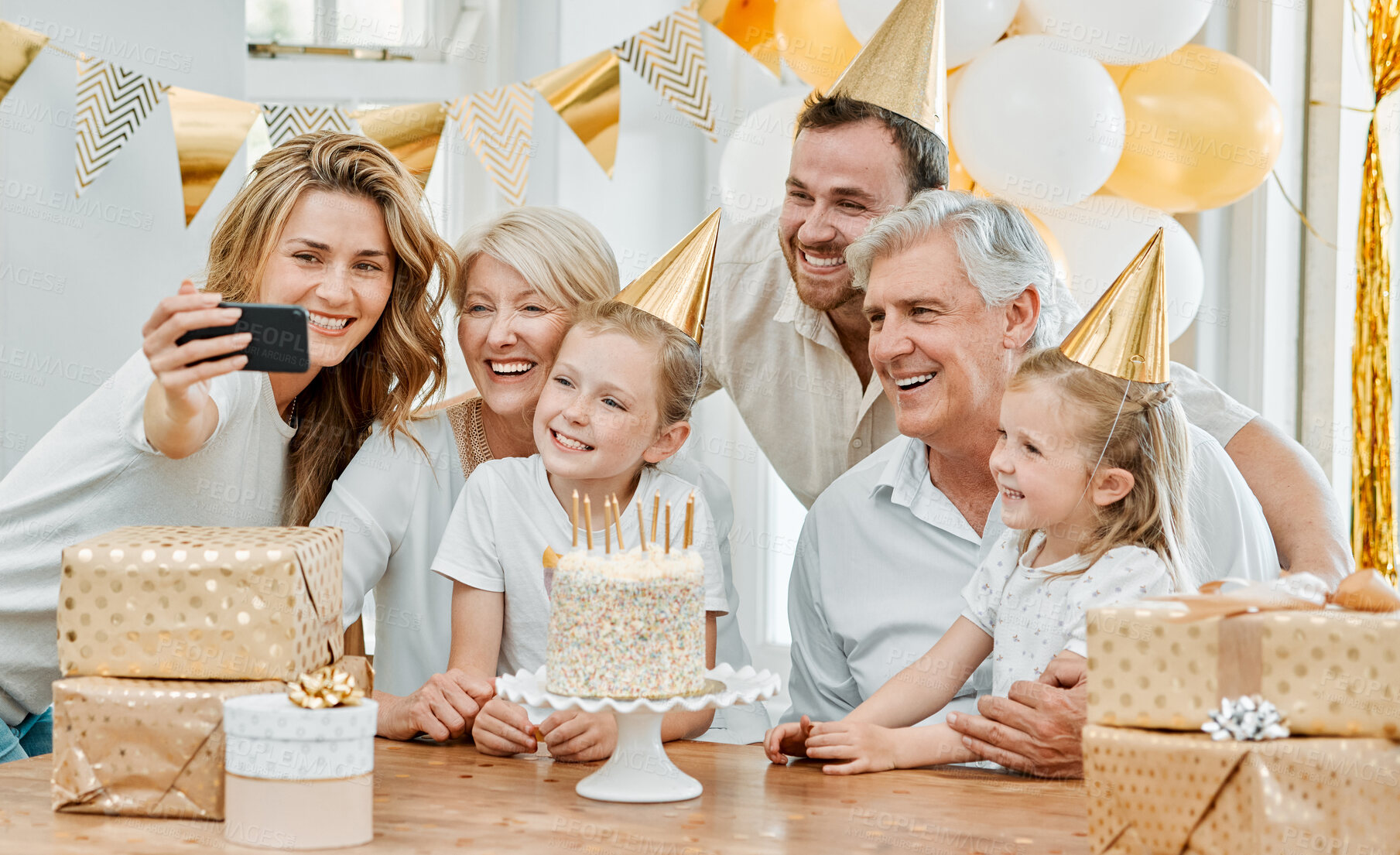 Buy stock photo Selfie, party and family to celebrate birthday in home, social media post and camera app for picture. People, generations and proud of milestone, photography and capture memory of presents and cake