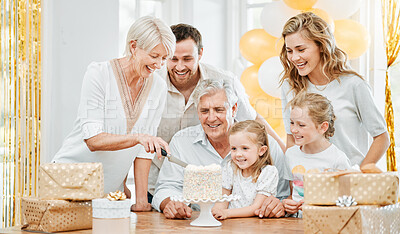 Buy stock photo Shot of a happy family celebrating a birthday at home