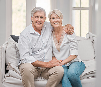 Buy stock photo Portrait, hug and senior couple on sofa for retirement with love relationship, support and happy smile in home. Embrace, mature woman and man on couch for peace, relax and bonding together for trust