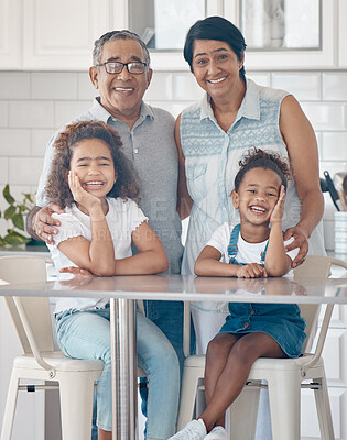 Buy stock photo Shot of grandparents spending time with their grandchildren