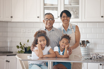 Buy stock photo Shot of grandparents spending time with their grandchildren