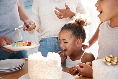Buy stock photo Shot of a family preparing to eat a cake at a birthday party at home