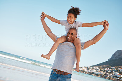 Buy stock photo Shot of a little girl and her father spending time at the beach