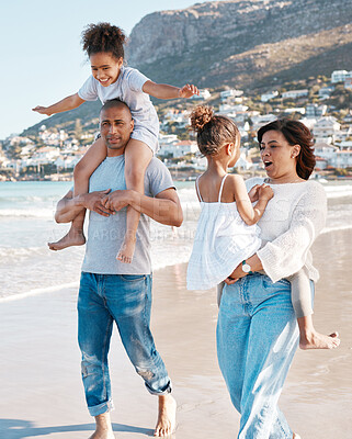 Buy stock photo Shot of a family spending a day at the beach
