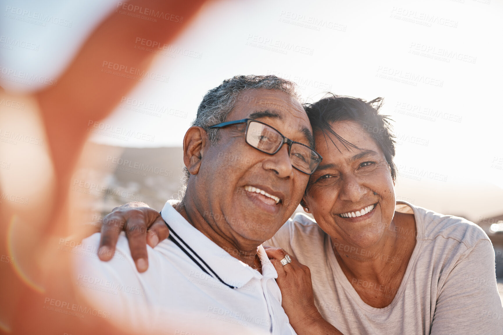 Buy stock photo Selfie, romance and a senior couple on the beach together during summer for a retirement holiday or vacation. Portrait, smile or dating with an old husband and wife posing for a photograph by the sea