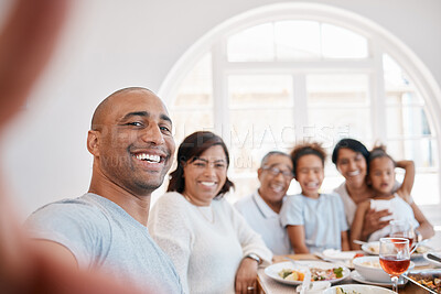 Buy stock photo Home, family and happy for selfie on dinner for thanksgiving, gathering and reunion. People, generations and smile with food or meal in table for memories, fun and social media with bonding and care