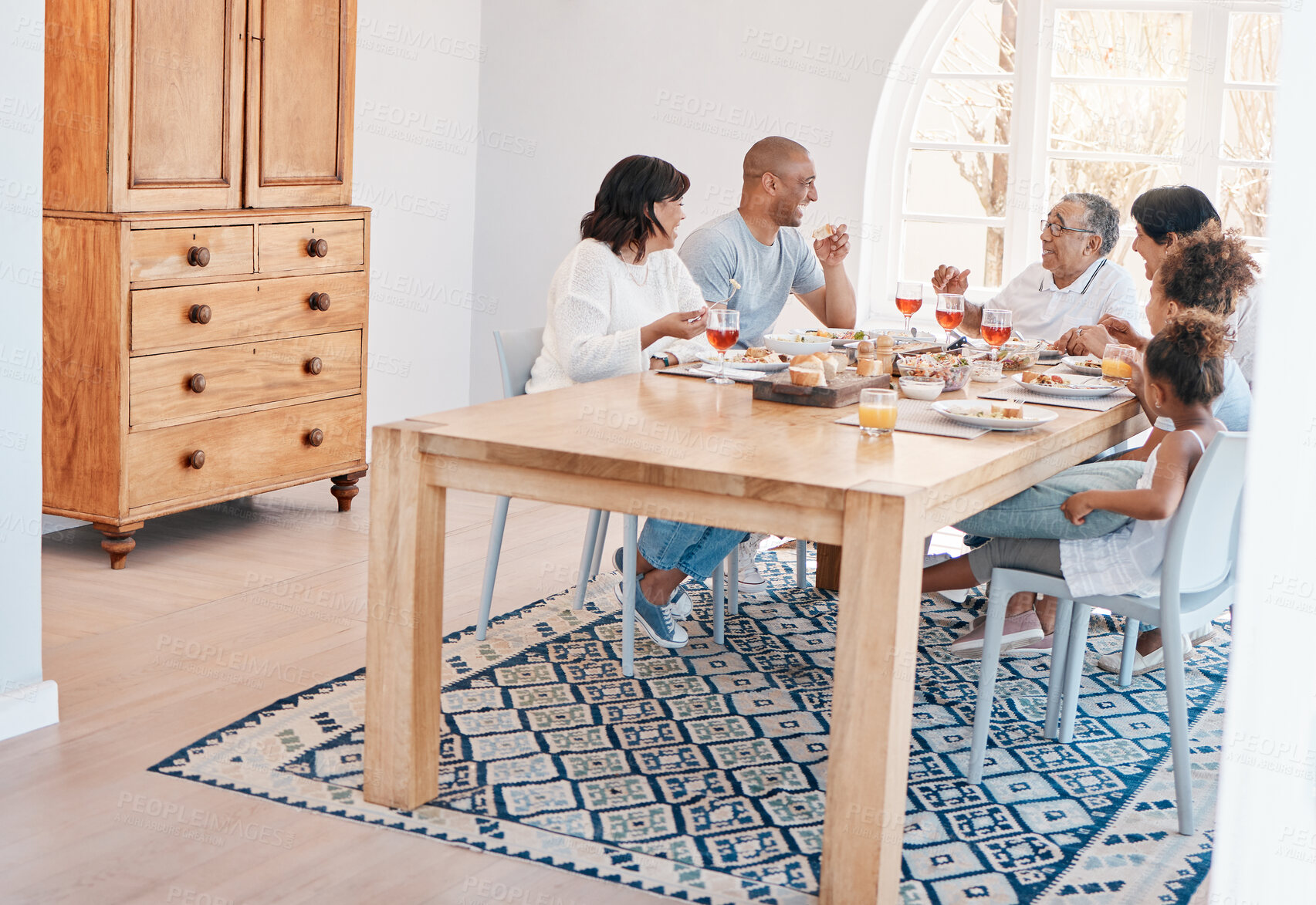 Buy stock photo Family, house and dining table for lunch conversation, social gathering and brunch sharing meal or grandparents. People, love and bonding or gourmet nutrition, apartment and together or healthy dish