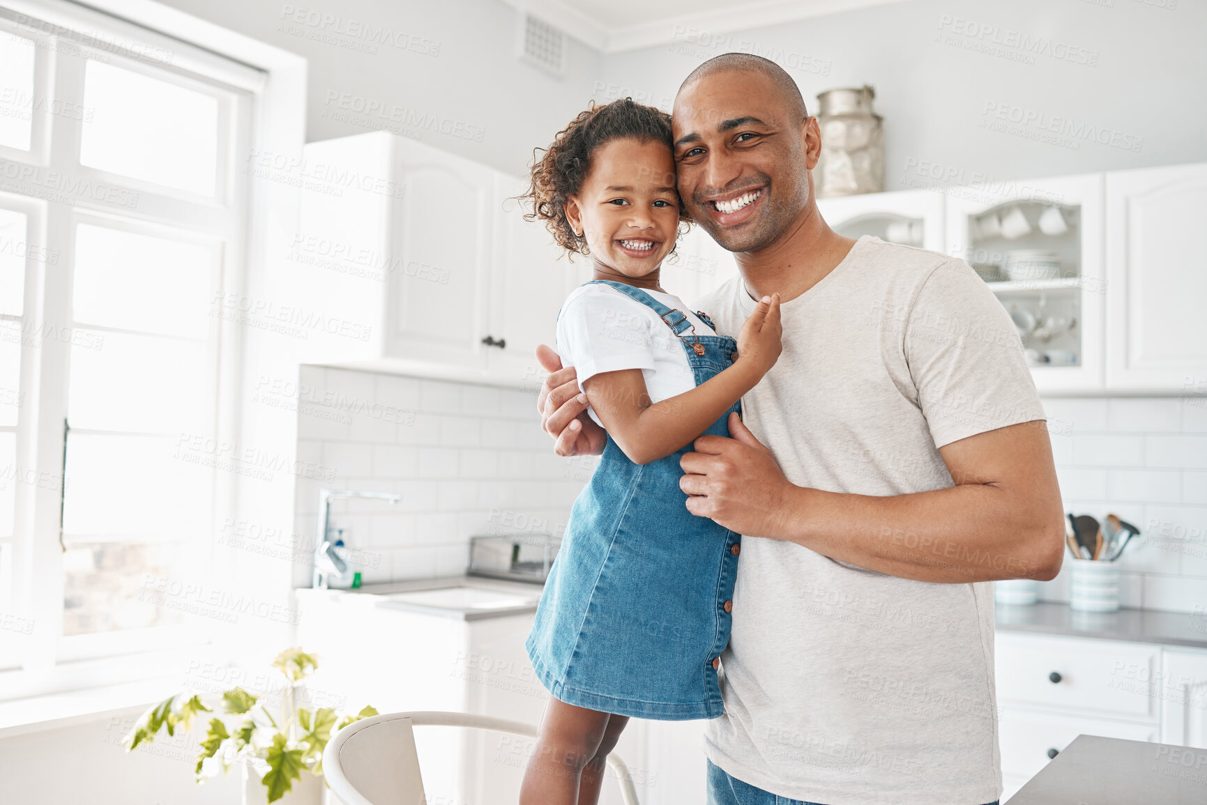 Buy stock photo Portrait smile, dad and girl with hug for care, love bonding and security in family home. Happy, father and young daughter with support, embrace and time together for weekend in apartment kitchen