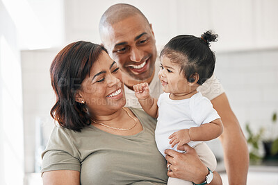 Buy stock photo Happy, dad and mom with baby for love relationship, care and bonding for development in family home. Smile, papa and mama with newborn girl for healthy growth, trust and relax together with security