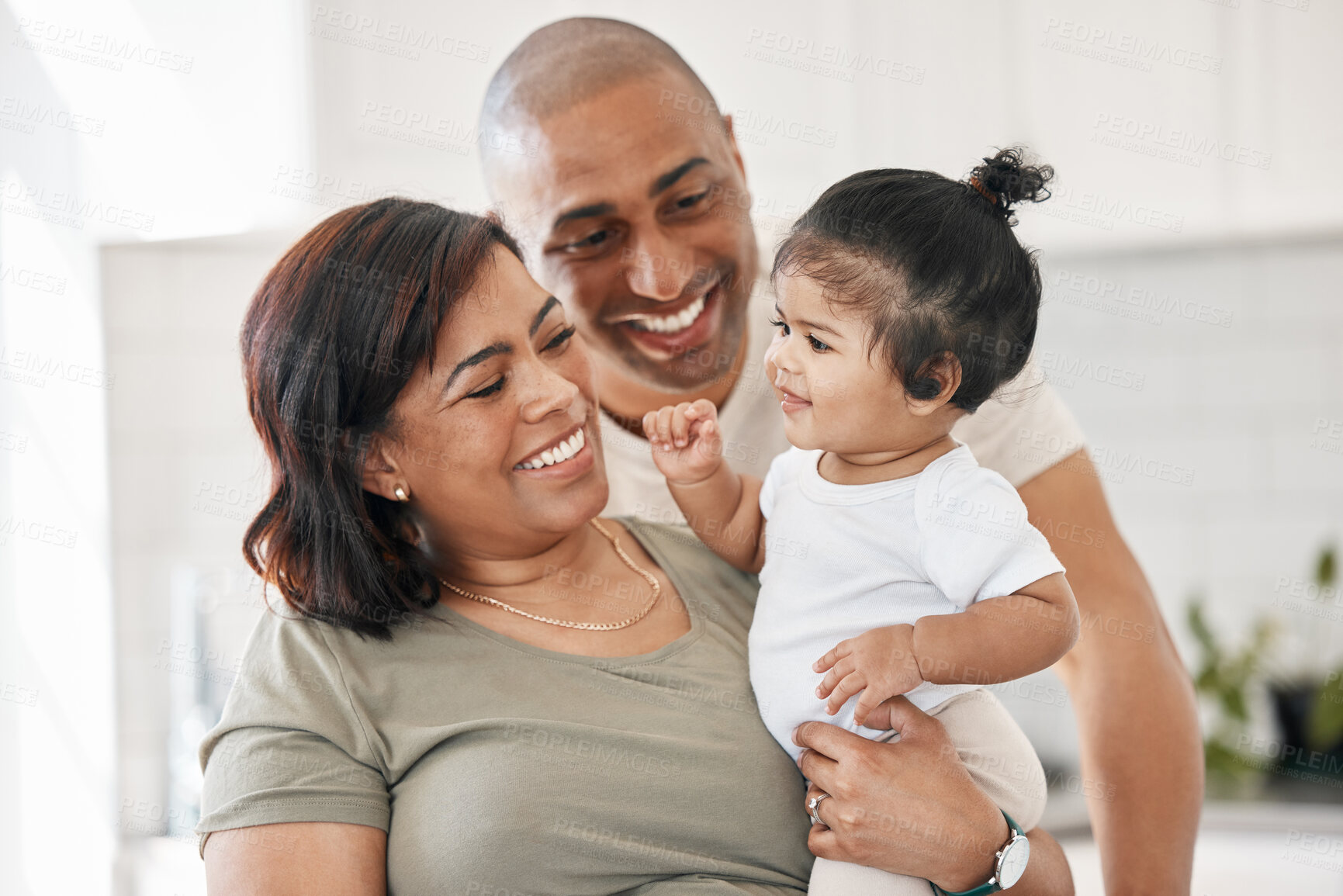 Buy stock photo Happy, dad and mom with baby for love relationship, care and bonding for development in family home. Smile, papa and mama with newborn girl for healthy growth, trust and relax together with security