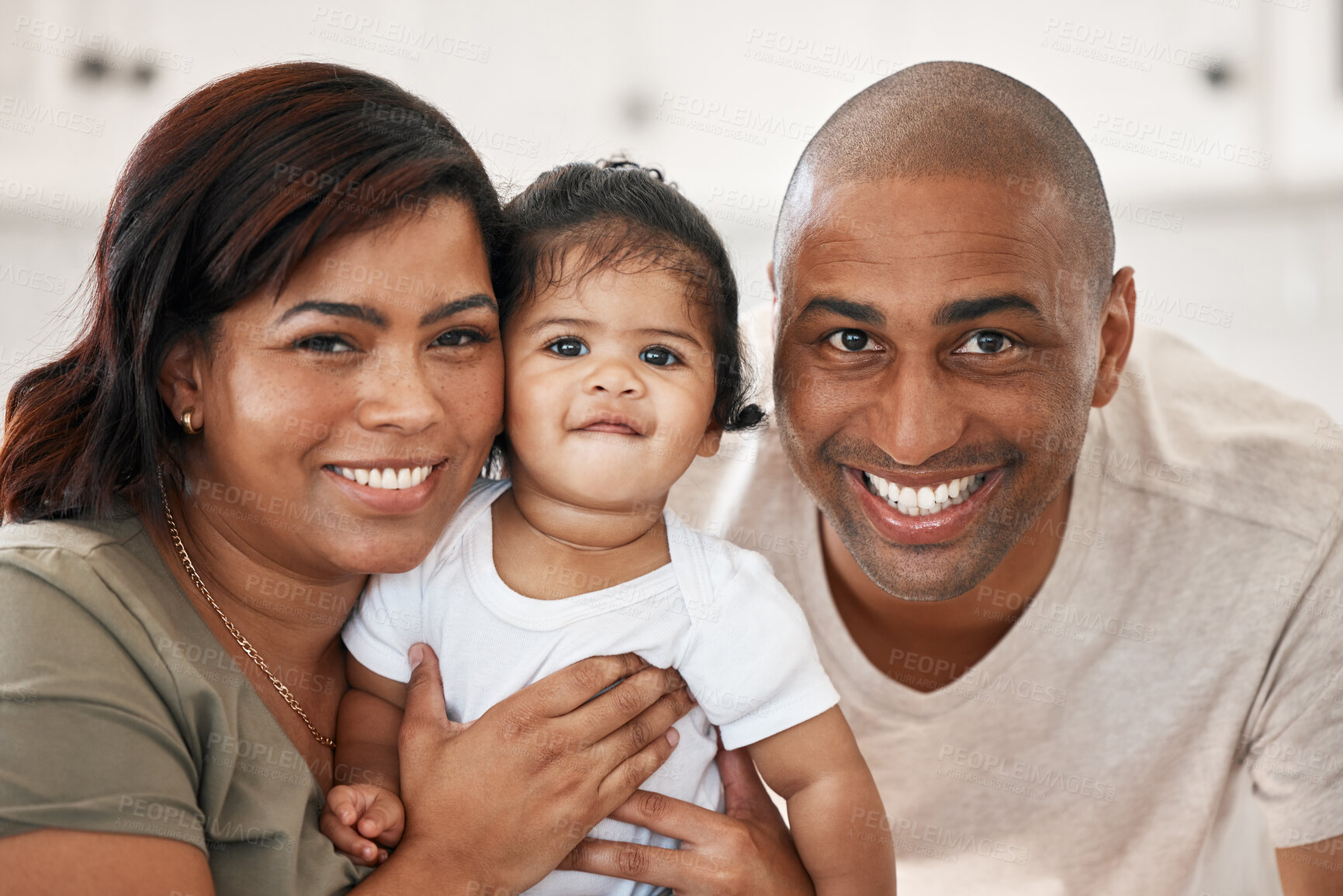 Buy stock photo Happy portrait, dad and mom with baby for love, care and bonding for development in family home. Face smile, father and mother with cute girl for growth, trust and relax together with security