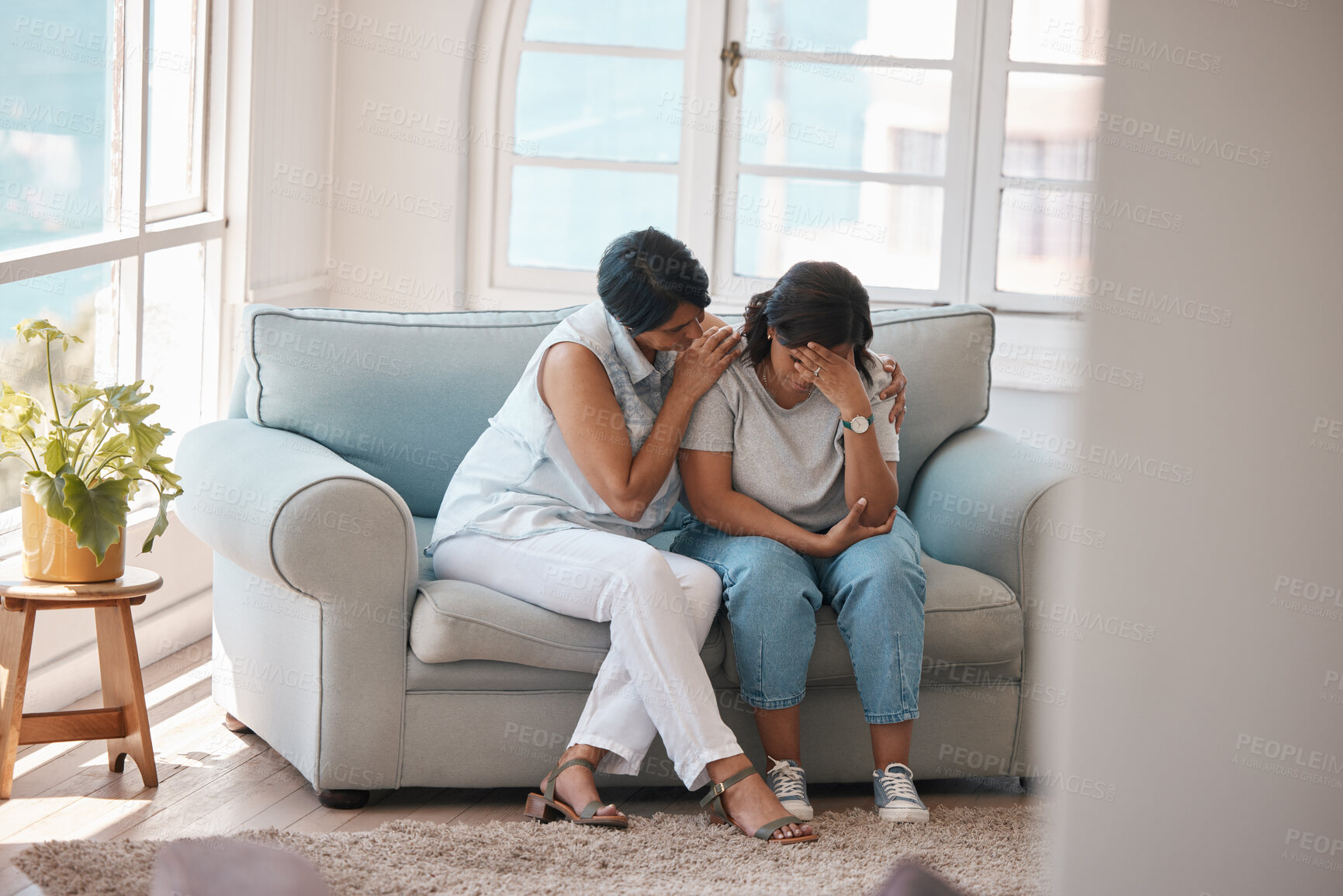 Buy stock photo Cry, senior woman or daughter on sofa for support, comfort or depression in marriage. Family, mom or loss of loved one at home with relationship development, trust or hug on couch for mental health