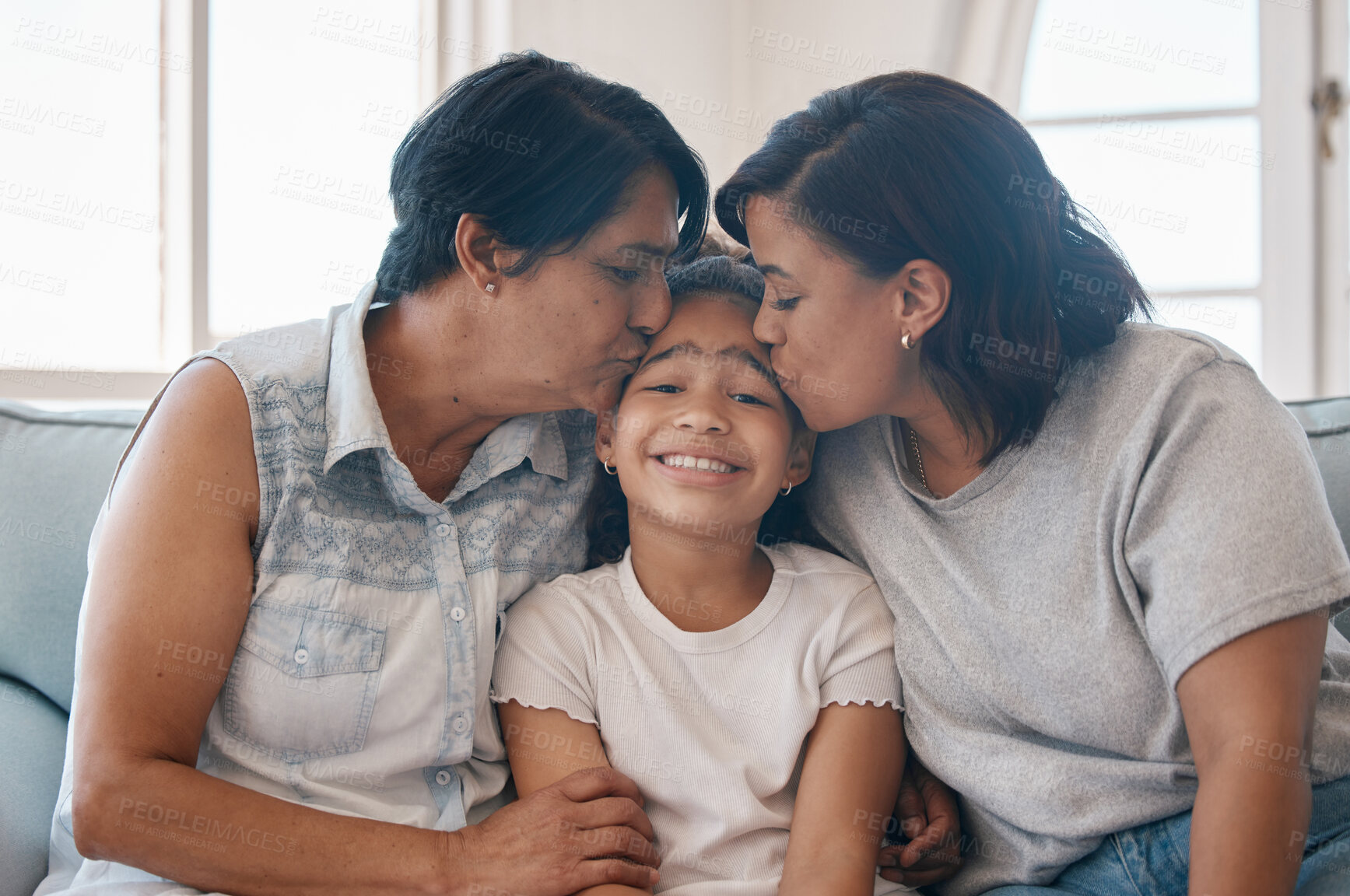 Buy stock photo Portrait, mom and grandma with girl for kiss on sofa for family time, bonding and embrace in modern house on weekend. Generations, child and home with hug for affection or care, together and cheerful