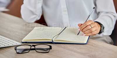Buy stock photo Shot of a businesswoman making notes