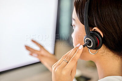 Buy stock photo Shot of a businesswoman using her PC while working in a call center