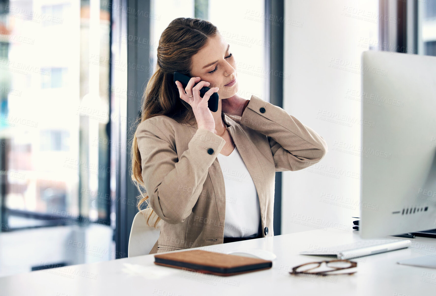 Buy stock photo Mental health, businesswoman on smartphone and at her desk in a modern workplace office. Networking or online communication, connectivity and stress with female person on a call with her cellphone