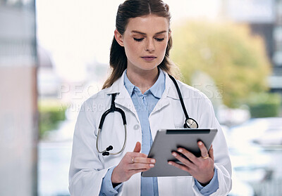 Buy stock photo Tablet, woman or doctor in hospital with research to search for medicine web info on social media. Telehealth, scroll or medical healthcare professional reading or browsing on app to chat in clinic 