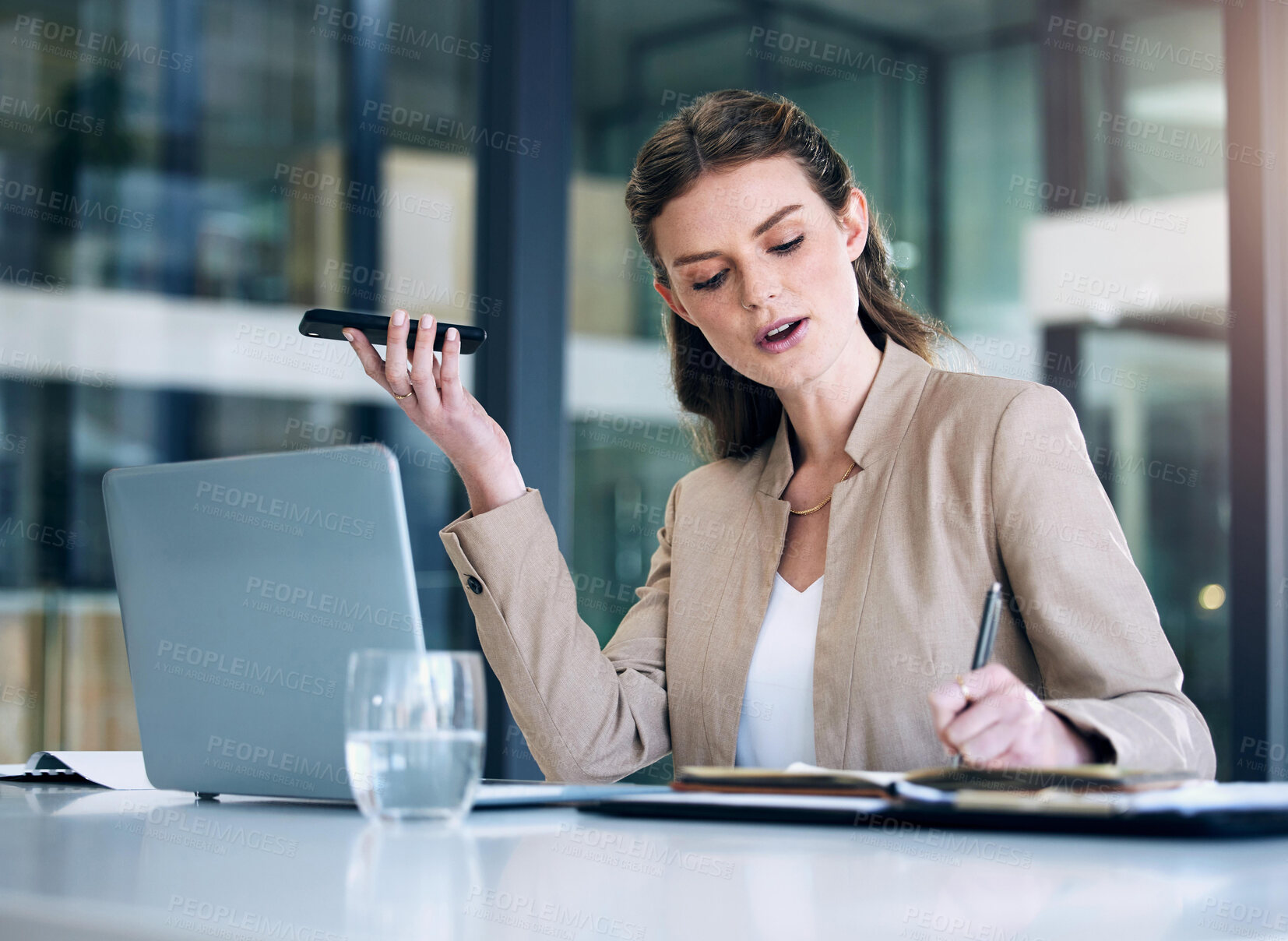 Buy stock photo Employee, phone call and woman writing, speaker and connection with laptop, conversation and advertising agency. Female person, administration or sales agent with a smartphone, discussion or notebook