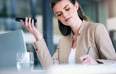 Buy stock photo Business woman, writing and speaker phone for communication, planning or strategy at the office. Female person or employee in project management with mobile smartphone app or voice note at workplace