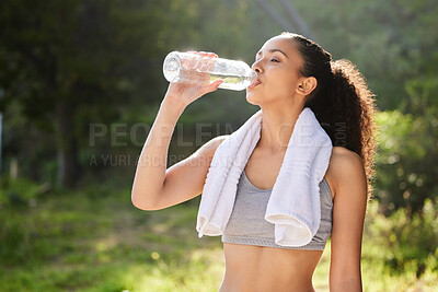 Buy stock photo Park, bottle and drink water for girl with towel, outdoor and exercise for fitness, forest and break in nature. Wellness, healthy and woman in woods, hydration and workout with liquid and athlete