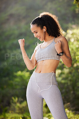 Buy stock photo Fitness, excited and woman outdoor with music for sports, exercise or audio for motivation. Happiness, female runner and headset for workout while listening radio, podcast or healthy to run in nature