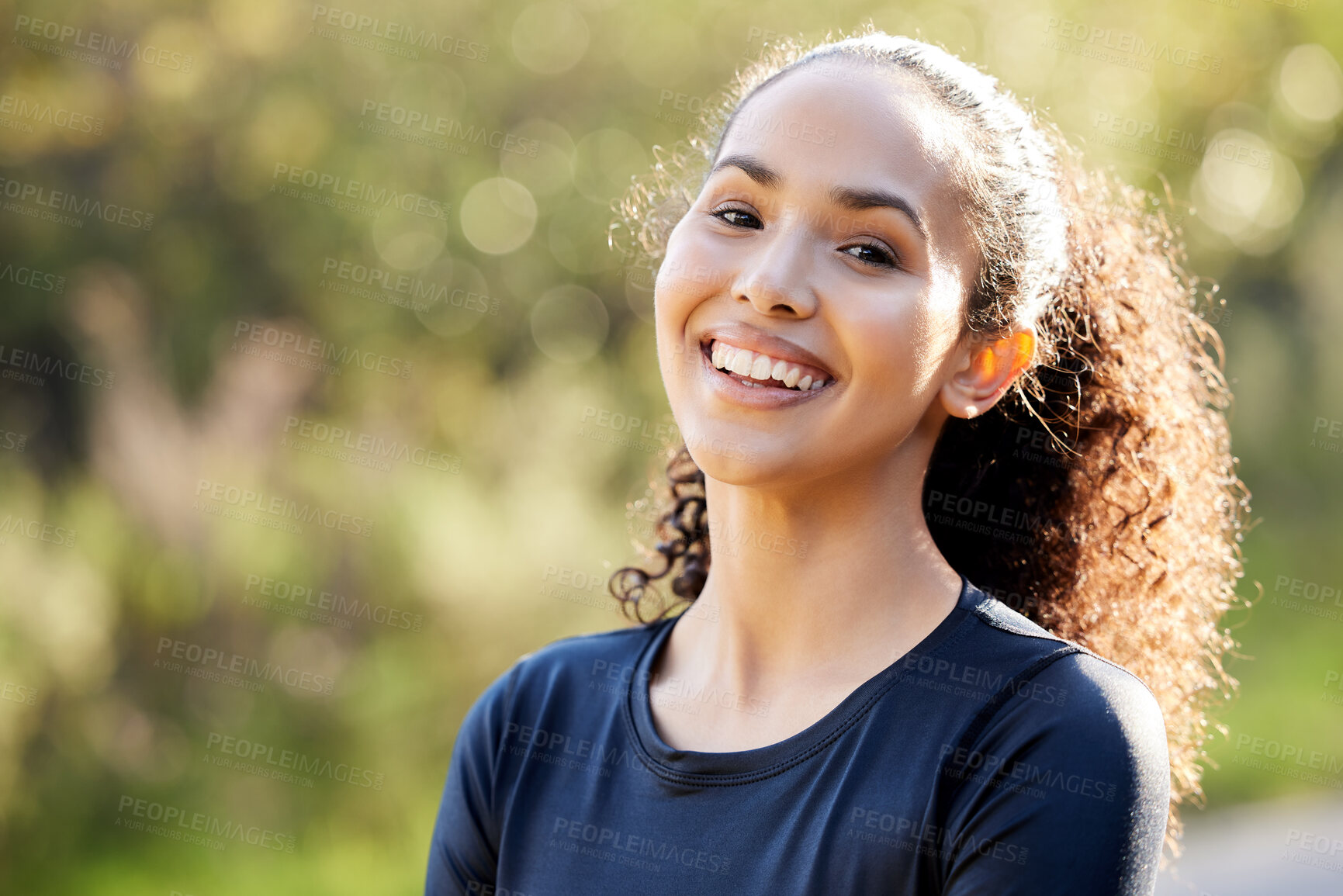 Buy stock photo Portrait of a beautiful young woman taking a break during her morning workout outside