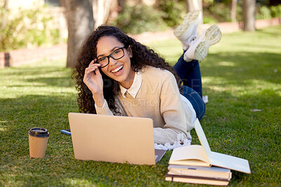 Buy stock photo Portrait of happy woman with laptop and notes in park for education, studying in nature and learning online. Smile, research and university student on campus grass with computer and books for project