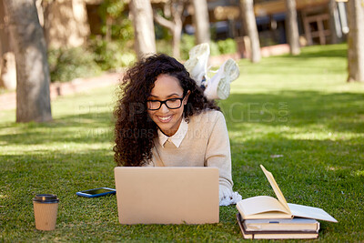Buy stock photo Woman with laptop and notes studying in park for education in nature to relax and learning online. Smile, research and happy university student in campus garden with computer and books for project.