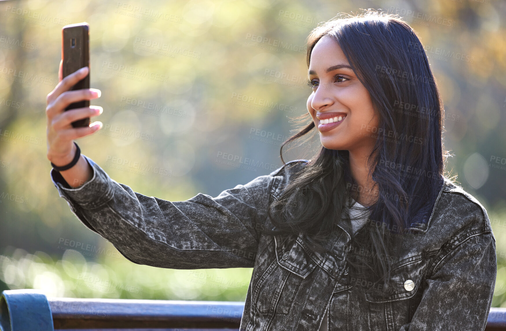 Buy stock photo Young woman, selfie and smile outdoor in park for social media, internet sharing and memories. Happy, female person or student in nature with technology for communication, contact and online post