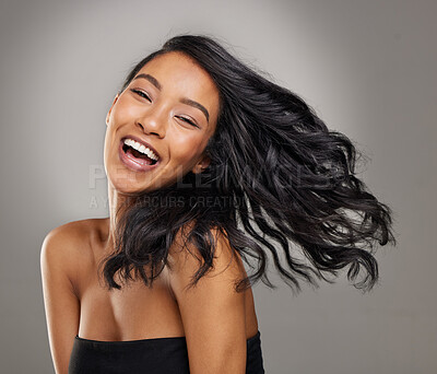 Buy stock photo Hair, smile and portrait of happy woman in studio for cosmetics, treatment and shine on grey background. Happy, face and haircare for female model with volume, texture and keratin result satisfaction