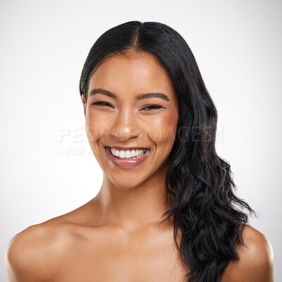 Buy stock photo Beauty, hair and portrait of happy woman in studio for cosmetics, treatment and shine on grey background. Smile, face and haircare for female model excited with volume, texture and keratin results