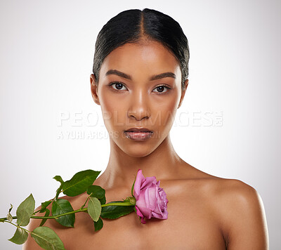 Buy stock photo Rose, skincare and beauty portrait of woman in studio for glow, shine or health isolated on white background. Natural flower, face makeup and organic cosmetics for dermatology, wellness or serious