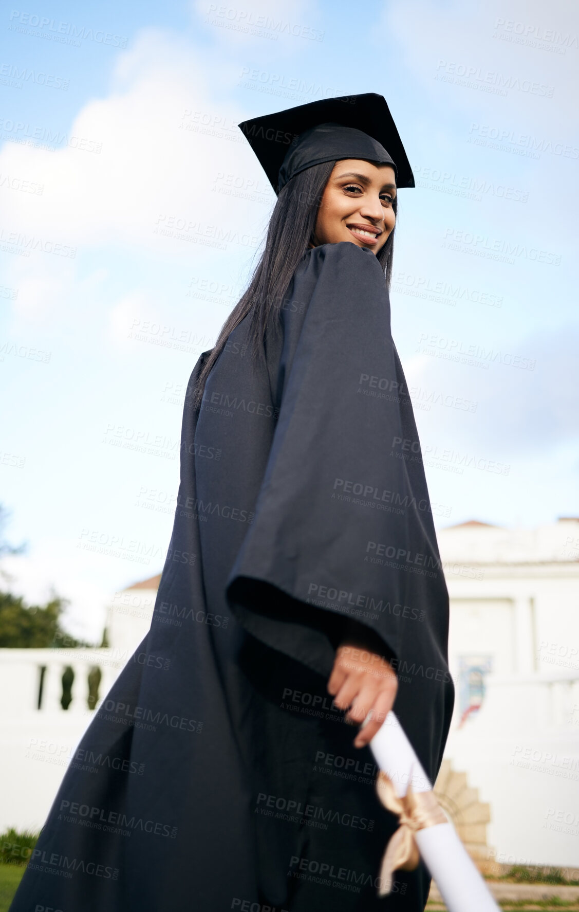 Buy stock photo Portrait, certificate and back with a woman graduate on university campus for a celebration event outdoor. Graduation, education and future with a happy young female student alone outside at college