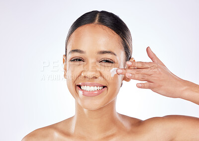 Buy stock photo Skincare, portrait and woman with cream in studio for moisturizer, benefits or collagen treatment. Female person, lotion and smile with product for cosmetics, routine or self care on white background