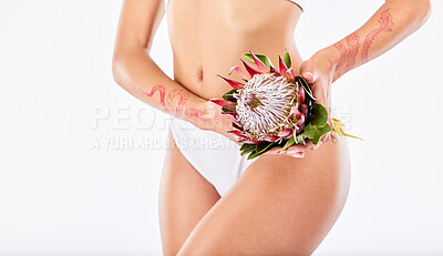 Buy stock photo Studio shot of an unrecognizable woman posing in her underwear against a white background