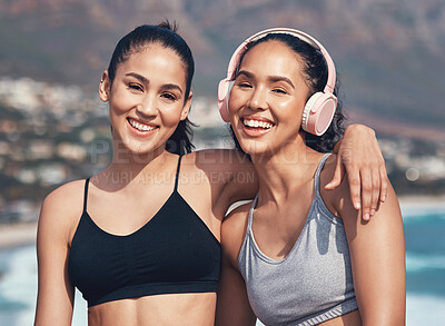 Buy stock photo Shot of two young friends working out together