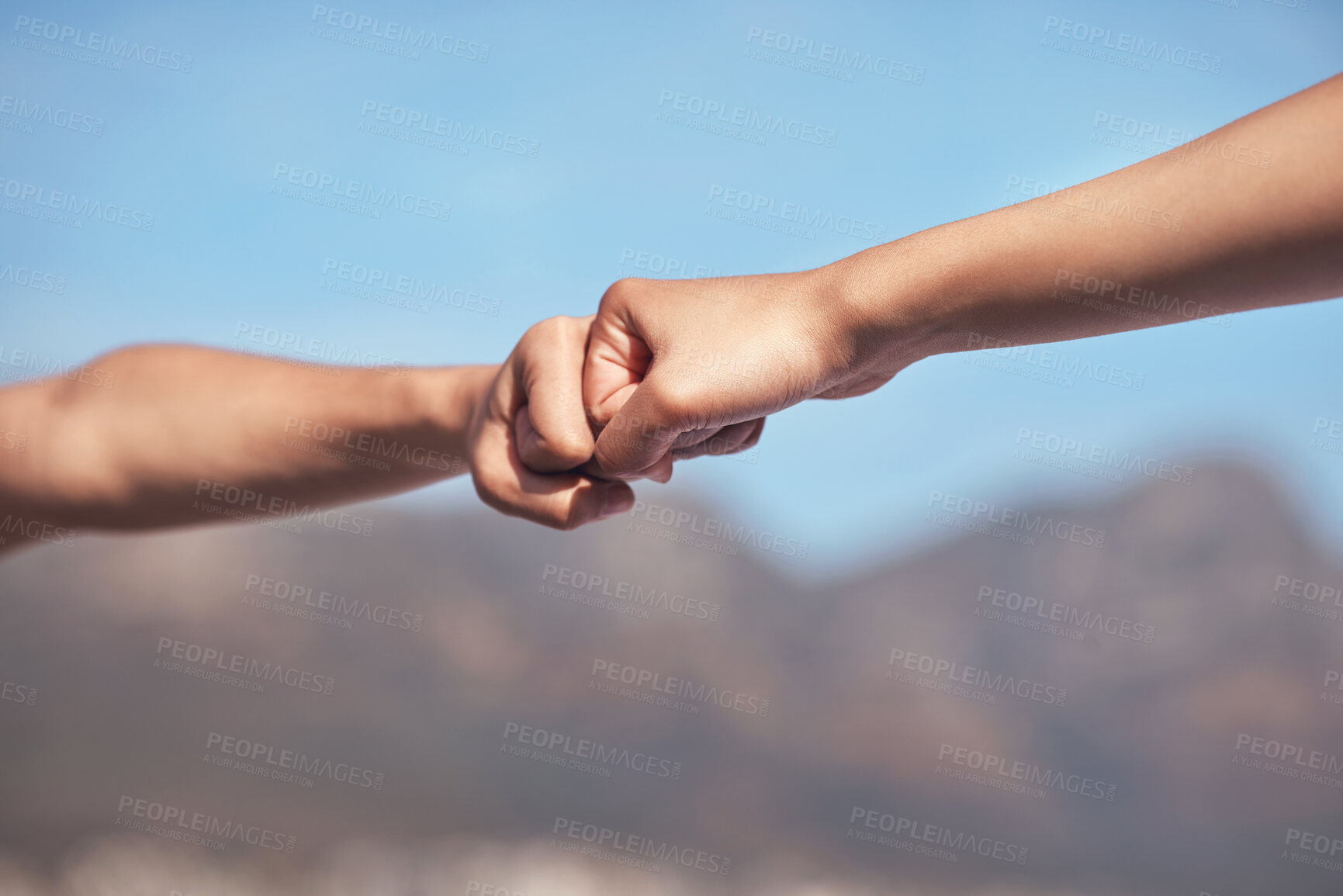 Buy stock photo Shot of two workout partners fist bumping one another