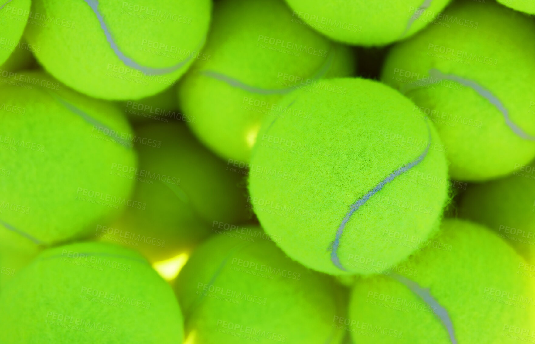 Buy stock photo Shot of an empty tennis court and tennis balls during the day