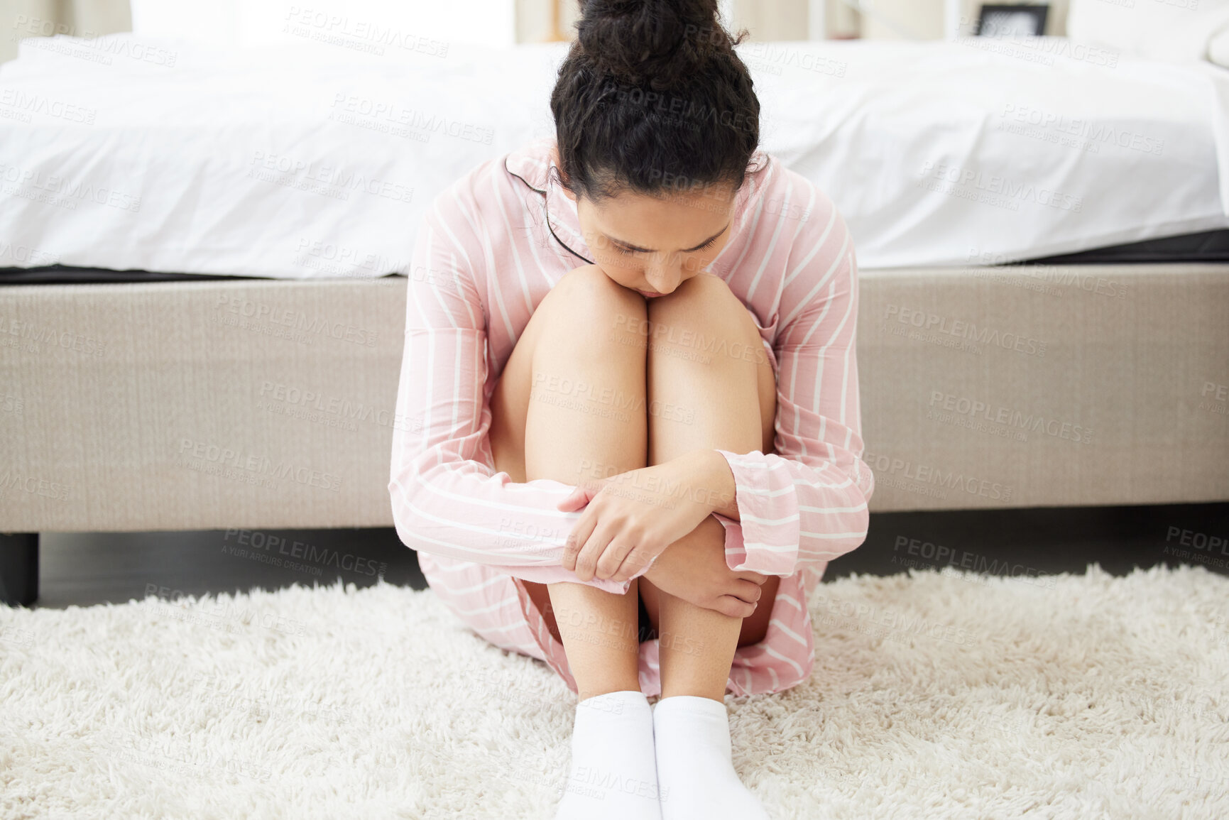 Buy stock photo Stress, depression or sad woman in bedroom in home with trauma, broken heart or crisis. Anxiety, sick or tired girl on floor with insomnia for mental health challenge, disaster or thinking of mistake