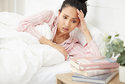 Buy stock photo Stress, woman and student lying in bed with books for education, project deadline or studying for exam. Scholar, anxiety and female person in bedroom for burnout, test or literature course in home