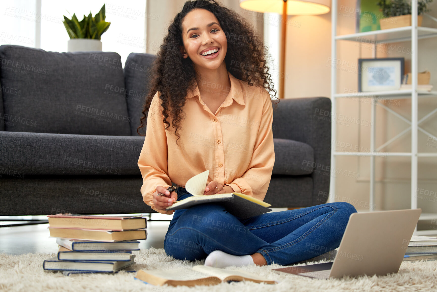 Buy stock photo Shot of a young woman working and studying from home