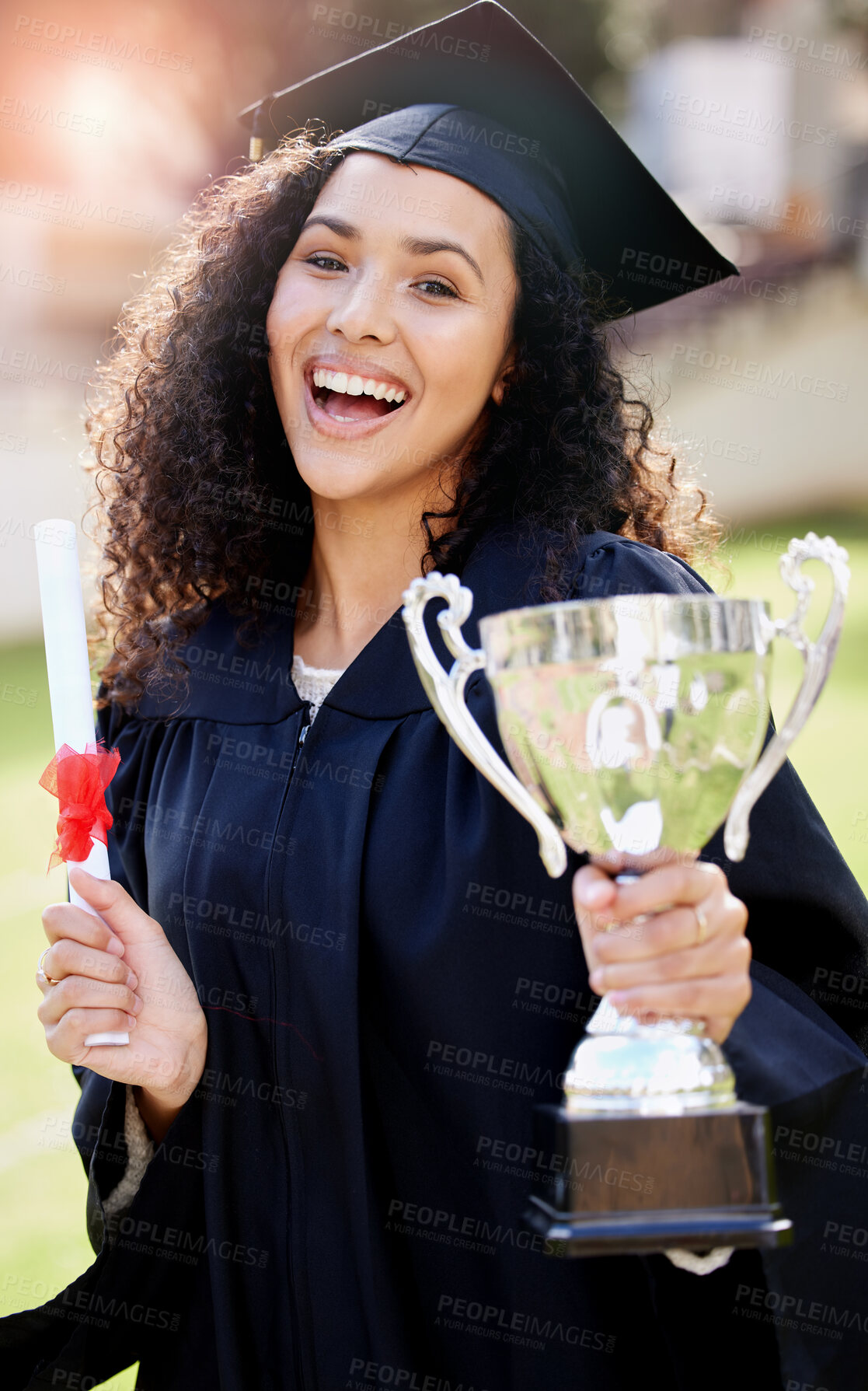 Buy stock photo Woman, graduation and celebrate with trophy and portrait, diploma and happy student for university. Prize, scholar and robe with mortar for degree, achievement and female person with certificate